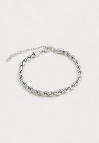 Ασημένια βιδωτή αλυσίδα βραχιόλι με ρυθμιζόμενο κούμπωμα και αλυσίδα επέκτασης σε λευκό φόντο.