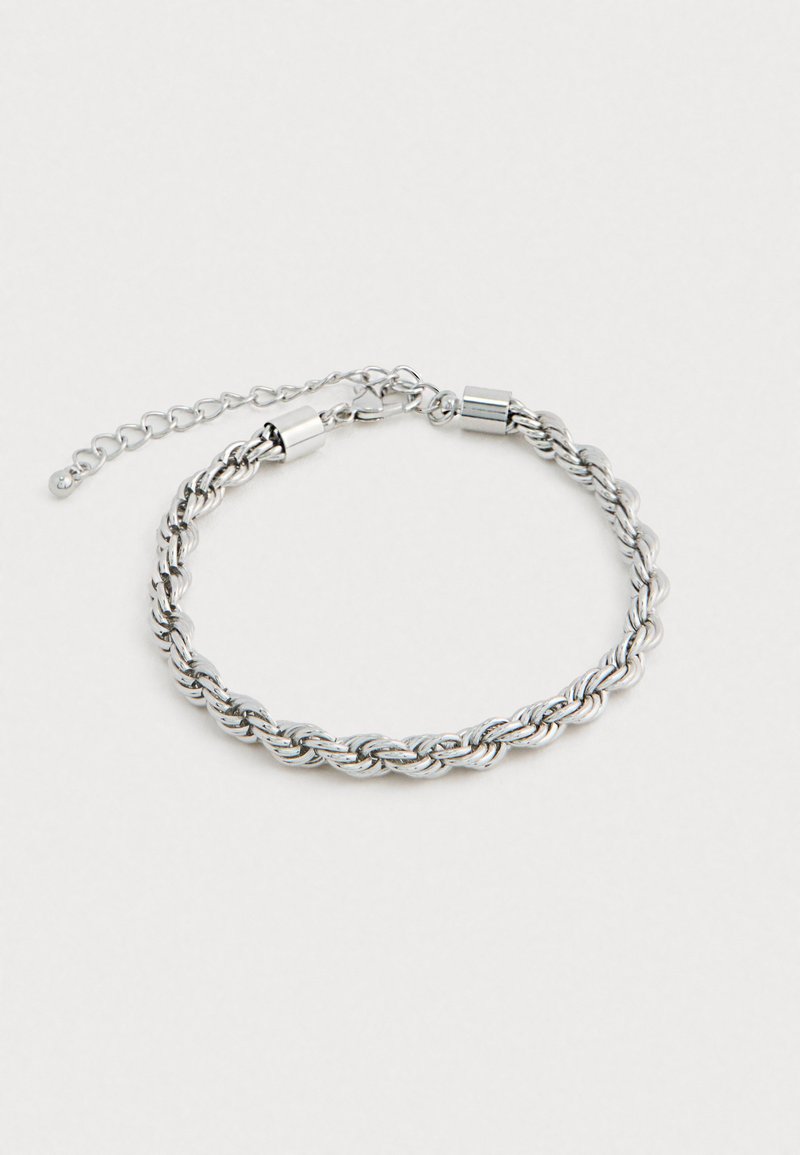 Ασημένια βιδωτή αλυσίδα βραχιόλι με ρυθμιζόμενο κούμπωμα και αλυσίδα επέκτασης σε λευκό φόντο.