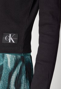 Calvin Klein Jeans Kofta - black