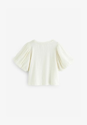 Cremefarbene Bluse mit kurzen, puffigen Ärmeln und rundem Ausschnitt. Aus strukturiertem Stoff gefertigt; schlichtes, sauberes Design ohne zusätzliche Details.