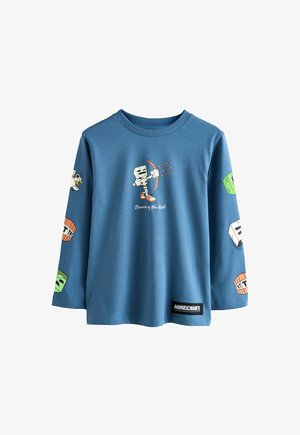 Blaues Langarm-T-Shirt aus Baumwolle; verfügt über Minecraft-Themen-Grafiken auf den Ärmeln und der Brust, einschließlich Charakteren und Blöcken.