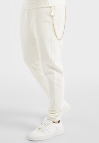 SIKSILK Teplákové kalhoty - off-white