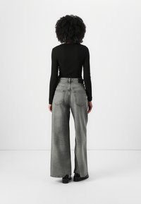 Tommy Jeans CHARLIE LOOSE  - Wide leg - denim grey