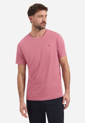 Rosa T-Shirt mit kurzen Ärmeln aus weichem Stoff; mit einem runden Ausschnitt und einem kleinen Logodetail auf der Brust. Glatte Textur, lässige Passform.