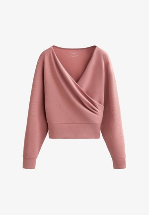 Roza rebrasta majica z dolgimi rokavi, v-izrezom in sprednjim nabiranjem, s kratko dolžino in manšetami na rokavih.