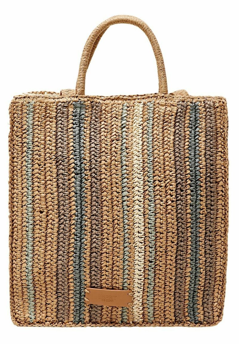 Pleciona torba ze słomy o kwadratowym kształcie, z beżowymi, brązowymi i zielonymi paskami. Posiada dwa plecione uchwyty oraz mały brązowy element ozdobny.