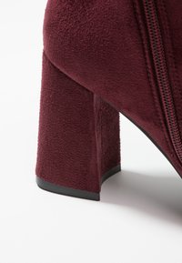 Anna Field Tronchetti - dark red