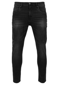 Černé džíny z denimu se slim střihem, mírně vybledlým vzhledem, detaily ve formě žíhaných vzorů a ošoupanými akcenty na přední straně.