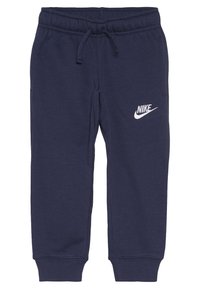 Navyblå sweatpants i mjuk bomullsmix, med elastisk midja och dragsko samt en vit Nike-logotyp på vänster lår.