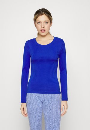 - Bluzka z długim rękawem