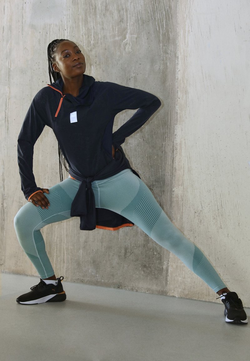 Damen Sportbekleidung | Puma RUN FIRST MILE MIDLAYER Sport T-shirt parisian night/dunkelblau - HT60842 Damen Sportbekleidung | Puma RUN FIRST MILE MIDLAYER Sport T-shirt parisian night/dunkelblau - HT60842