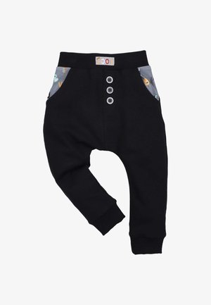 Zwarte joggingsbroek met een rekbare tailleband, voorzien van drie zilveren knopen en kleurrijk gepatterneerde zakken. Zacht, comfortabel materiaal.