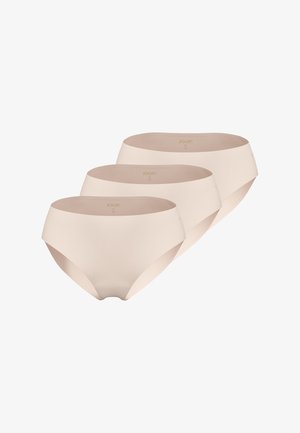 Trois culottes beiges sans coutures pour femmes, taille moyenne, disposées en ligne décalée sur fond blanc.