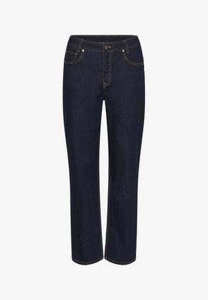 Tumedat sinist teksaseid sirge lõikega. Omavad viit taskut, kuldseid õmblusi ja eesmine nööpide sulgemine.