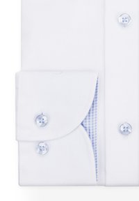 Biała koszula z mankietami, prezentująca tkany wzór, z jasnoniebieskimi akcentami i wstawką w kratkę. Ozdobiona przezroczystymi guzikami i starannie przeszytymi szwami.