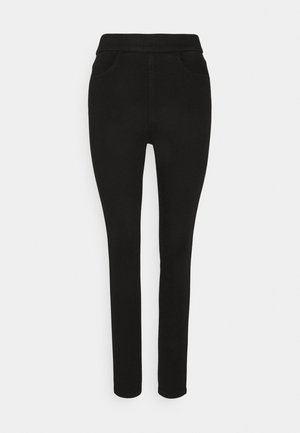 Pantaloni neri elasticizzati con una vestibilità aderente, vita elastica e due tasche frontali. Il tessuto ha una superficie liscia e una forma che aderisce al corpo.
