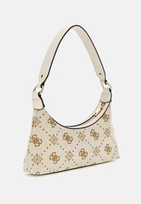 White handbag with a textured fabric and gold geometric pattern, featuring a curved strap and zipper closure, outlined in black trim.