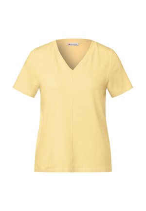 T-shirt giallo a maniche corte con scollatura a V, tessuto morbido e orlo dritto. Taglio pulito senza motivi o decorazioni visibili.