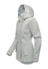 Manteau d'hiver gris clair pour femme avec fermeture éclair à l'avant, capuche à cordon, poches latérales et patch de marque sur la manche gauche.