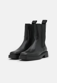 Vagabond Kotníkové boty na platformě - black