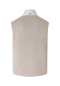 Veste sans manches en maille beige avec un col beige clair présentant une petite étiquette logo rectangulaire au centre du dos.