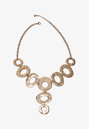 Ogrlica zlatne boje s teksturiranim, nepravilnim otvorenim ovalnim karikama povezanima lancem, s dvostrukim visećim privjeskom.