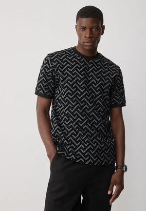 - T-shirt z nadrukiem