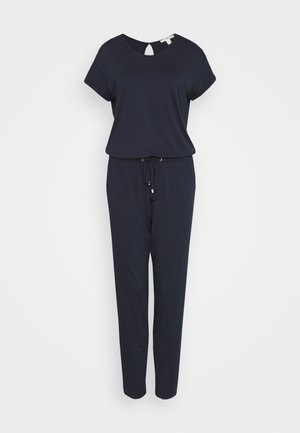 Navy jumpsuit with short sleeves, round neck, and a back keyhole detail. Features an elastic waist with a drawstring for adjustment.