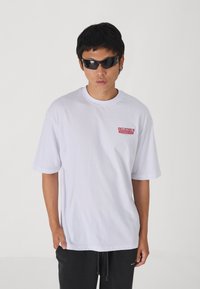 Abercrombie & Fitch TIMELESS GLOBAL TREND LOGO RELAXED - Träningsbyxor - black