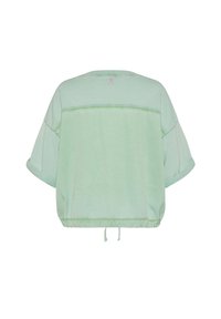Miętowo zielony krótki top z krótkimi, szerokimi rękawami, marszczonym dołem i gładką fakturą. Posiada poziome szwy na plecach.