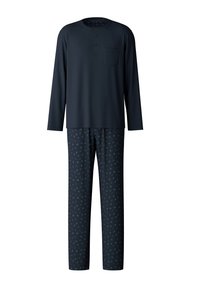 Marineblauw pyjama overhemd met lange mouwen, een zak en knoopsluiting; bijpassende broek heeft een patroon van kleine kleurrijke vormen op een donkere achtergrond.