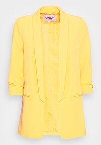 Žlutý blazer s šálovým límcem, tříčtvrtečním rukávem, měkkou tkaninou, otevřeným předním dílem a dvěma předními kapsami. Hladký, strukturovaný povrch.