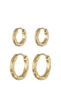 Boucles d'oreilles en forme de créoles de couleur dorée, avec une surface texturée et irrégulière. Quatre pièces : deux créoles plus grandes et deux créoles plus petites, avec une fermeture à clip.