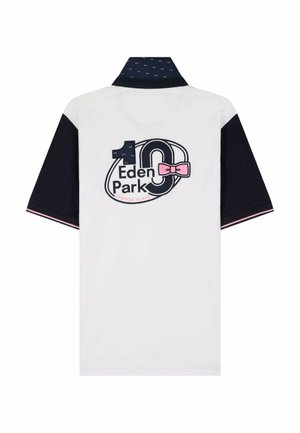 Polo manches courtes blanc et noir avec le logo "10 Eden Park", un nœud rose et le texte "French Flair" au dos. Bordures roses sur les manches.