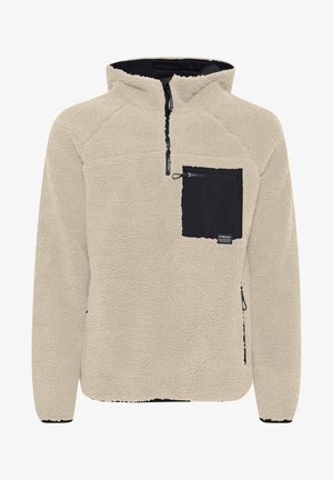 Beige fleece-pullovers med en svart brystlomme. Har glidelås forening og teksturert stoff. Hette-design med kontrastdetaljer.