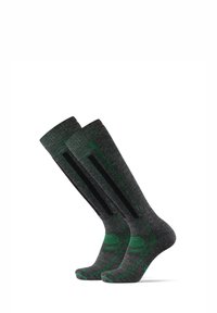 Calcetines gris hasta la rodilla con acentos verdes, hechos de un tejido texturizado, que presentan un diseño a rayas y un refuerzo en la puntera y el talón.