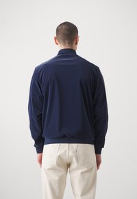 EA7 Emporio Armani JACKET - Bomberjacka - blu navy