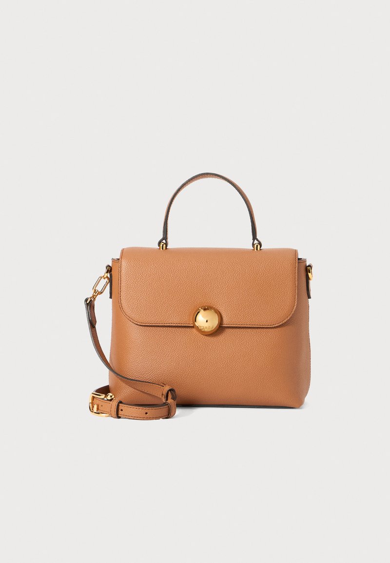 Tan leather handbag with a structured shape, top handle, detachable shoulder strap, and a gold-tone circular clasp on the front.