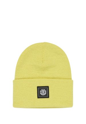 Bonnet en tricot jaune avec un large revers et un patch carré noir arborant un design circulaire. Fabriqué à partir d'un matériau doux et texturé.