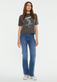 System Action Print T-shirt - marrón oscuro