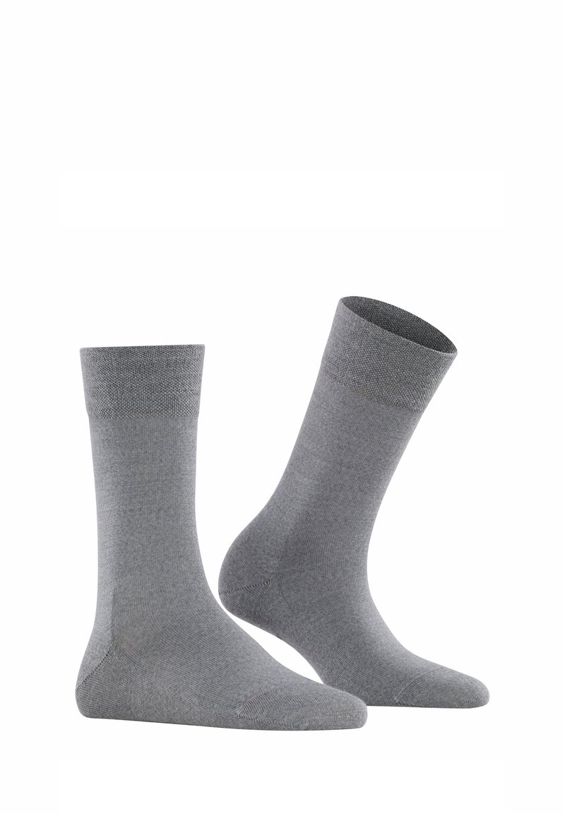 Calze in cotone grigio con una zona a coste, lunghezza fino al polpaccio, texture liscia, rinforzo sulla punta e sul tallone per garantire durata.