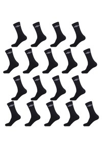 Chaussettes noires en mélange de coton, avec un revers côtelé et un détail de logo en blanc. Arrangées en motif de grille.