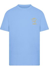 Light blue cotton t-shirt with short sleeves and a crew neckline. Features a small yellow cartoon graphic on the left chest area.