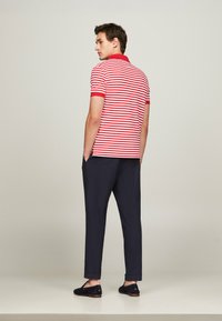 Tommy Hilfiger REGULAR - Polo - primary red white