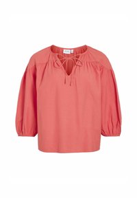 Koralbluse med løs pasform, rund halsudskæring og frontdetalje med bånd. Har puffede ærmer og et blødt, let stof.