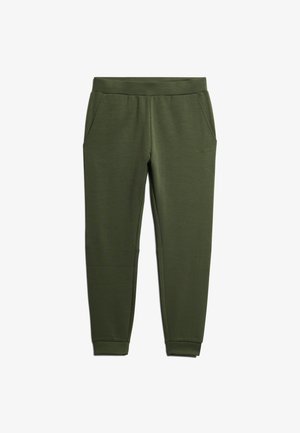 Olijfgroene sweatpants gemaakt van zacht materiaal, met een rekbare tailleband, zijzakken en een boord aan de enkels. Subtiele logo details aan de zijkant.