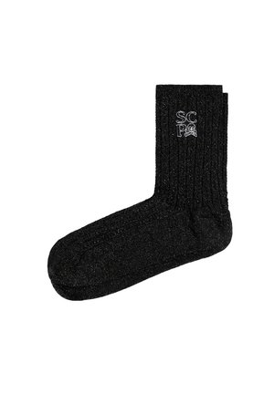 Calcetines negros con relieve, hechos de un material brillante, que cuentan con un pequeño logotipo bordado en blanco. Diseño de longitud estándar para el crew.