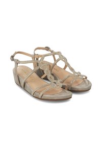 Sandalias de cuña beige con correas decorativas entrelazadas que presentan acentos de rhinestones. Parte trasera cerrada con correa de tobillo ajustable; base de textura suave.