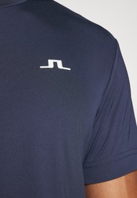 J.LINDEBERG Sports ADE - Basic póló - navy