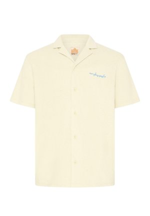 Κρεμ πουκάμισο με κοντά μανίκια και κουμπιά, με γιακά τύπου camp, διακοσμημένο με μικρή μπλε κέντημα "everyday people" στο αριστερό στήθος.